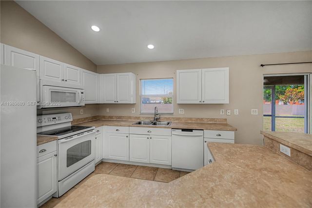 4104 SW 13th St., Lehigh Acres, FL 33976