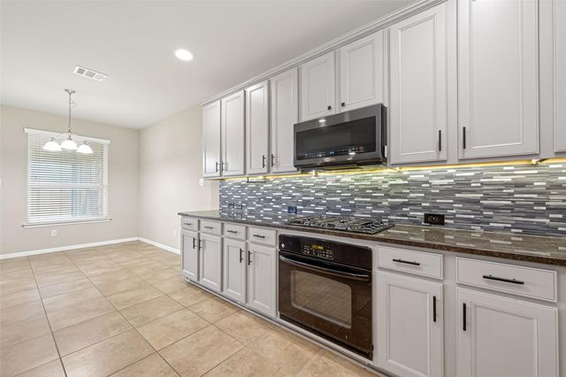 14718 Julie Meadows Lane, Humble, TX 77396