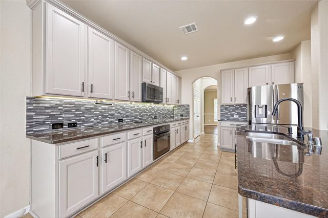 14718 Julie Meadows Lane, Humble, TX 77396