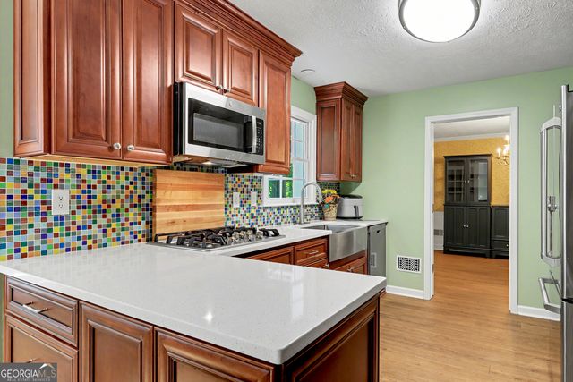 5602 Grist Stone Drive SW, Lilburn, GA 30047