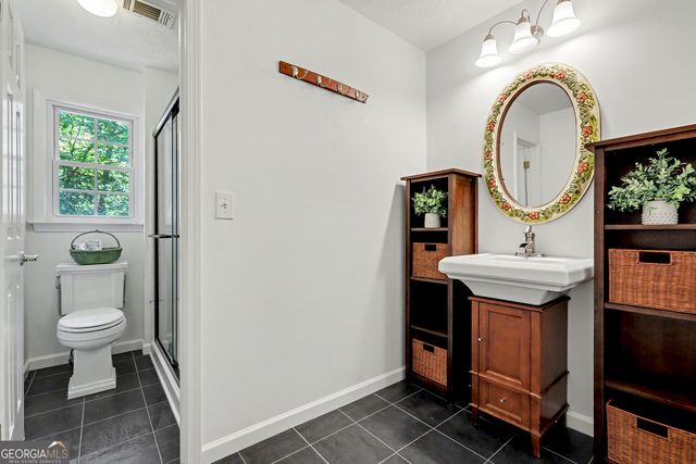 5602 Grist Stone Drive SW, Lilburn, GA 30047