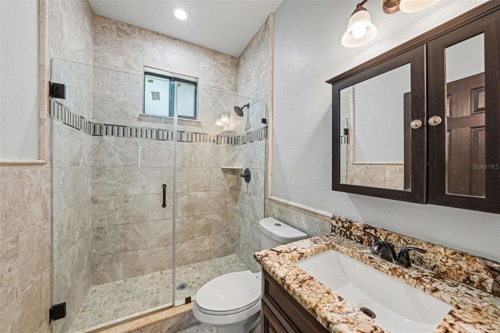 Image 13 of property listing at 7110 N TALIAFERRO AVENUE, Tampa, FL 33604