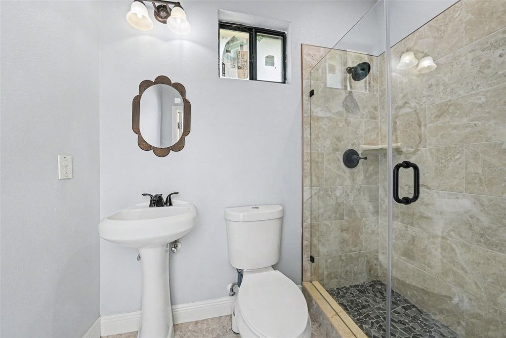 Image 17 of property listing at 7110 N TALIAFERRO AVENUE, Tampa, FL 33604