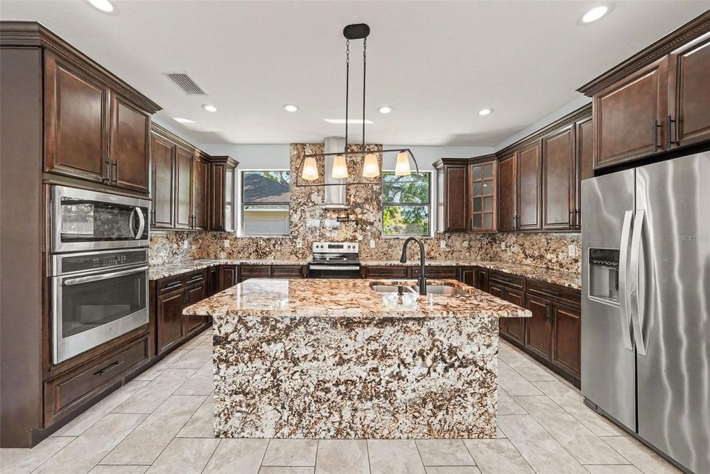 Image 5 of property listing at 7110 N TALIAFERRO AVENUE, Tampa, FL 33604
