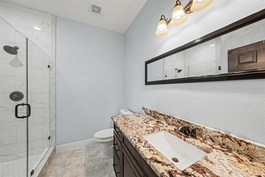 Image 9 of property listing at 7110 N TALIAFERRO AVENUE, Tampa, FL 33604