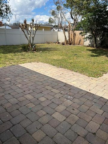 9739 POPLARWOOD COURT, Orlando, FL 32825