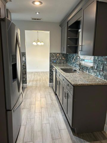 9739 POPLARWOOD COURT, Orlando, FL 32825