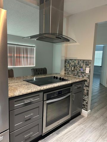 9739 POPLARWOOD COURT, Orlando, FL 32825