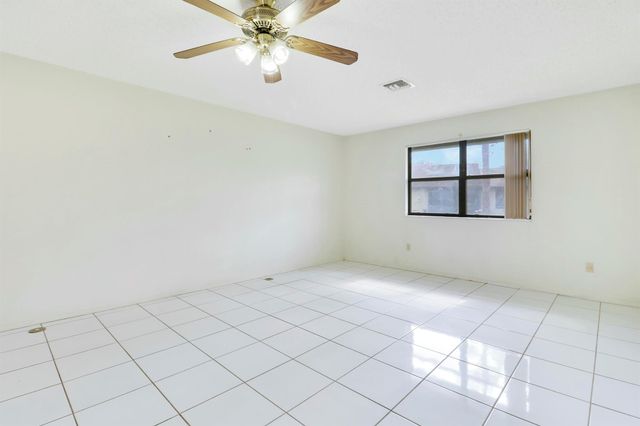 135 Manchineel Court, Royal Palm Beach, FL 33411