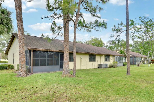 135 Manchineel Court, Royal Palm Beach, FL 33411