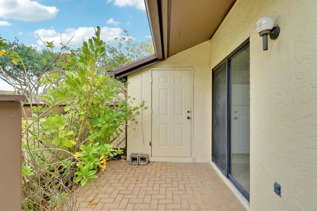 135 Manchineel Court, Royal Palm Beach, FL 33411
