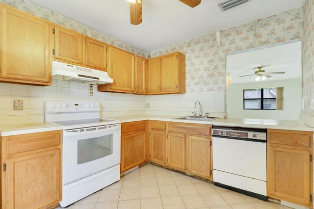 135 Manchineel Court, Royal Palm Beach, FL 33411