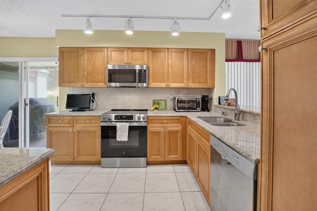 7825 Whispering Palms Drive 101, Boynton Beach, FL 33437