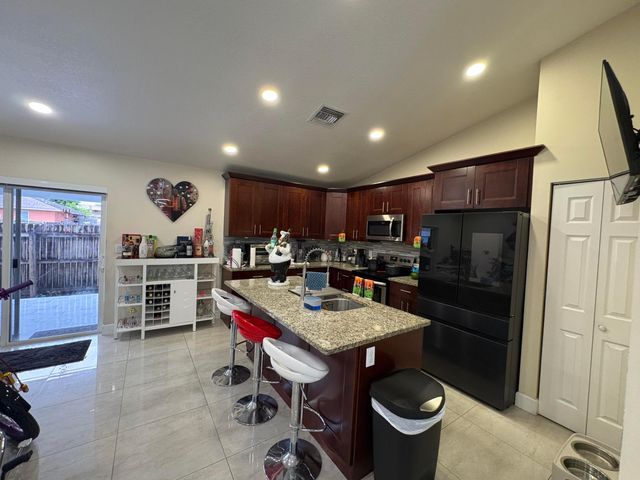 3941 TROPICAL Way, Palm Springs, FL 33461