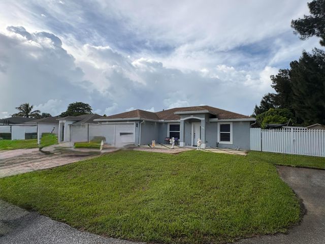 3941 TROPICAL Way, Palm Springs, FL 33461