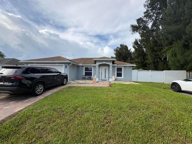 3941 TROPICAL Way, Palm Springs, FL 33461