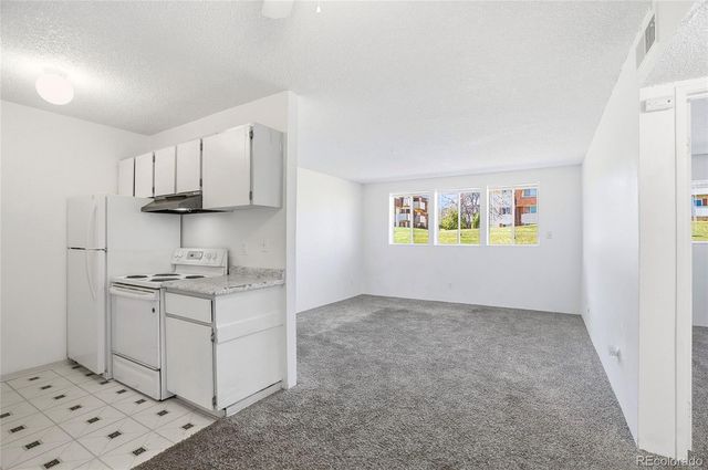 10211 Ura Lane 2-104, Denver, CO 80260