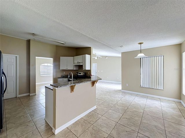 413 FLAMINGO CT, Poinciana, FL 34759
