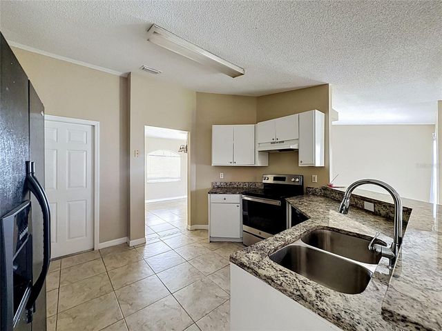 413 FLAMINGO CT, Poinciana, FL 34759
