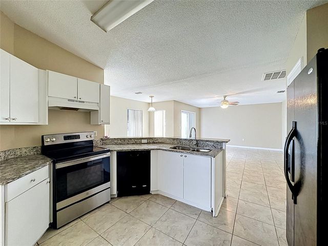 413 FLAMINGO CT, Poinciana, FL 34759