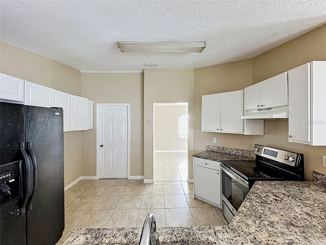 413 FLAMINGO CT, Poinciana, FL 34759