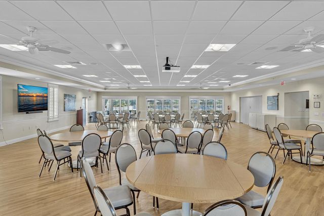 27 COLONIAL CLUB Drive 105, Boynton Beach, FL 33435