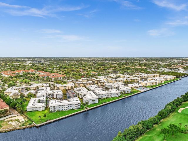 27 COLONIAL CLUB Drive 105, Boynton Beach, FL 33435