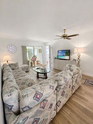 27 COLONIAL CLUB Drive 105, Boynton Beach, FL 33435