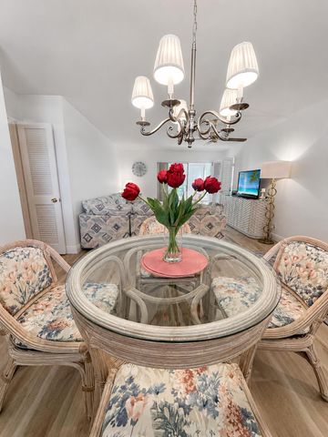 27 COLONIAL CLUB Drive 105, Boynton Beach, FL 33435