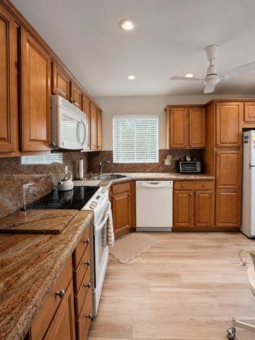 27 COLONIAL CLUB Drive 105, Boynton Beach, FL 33435