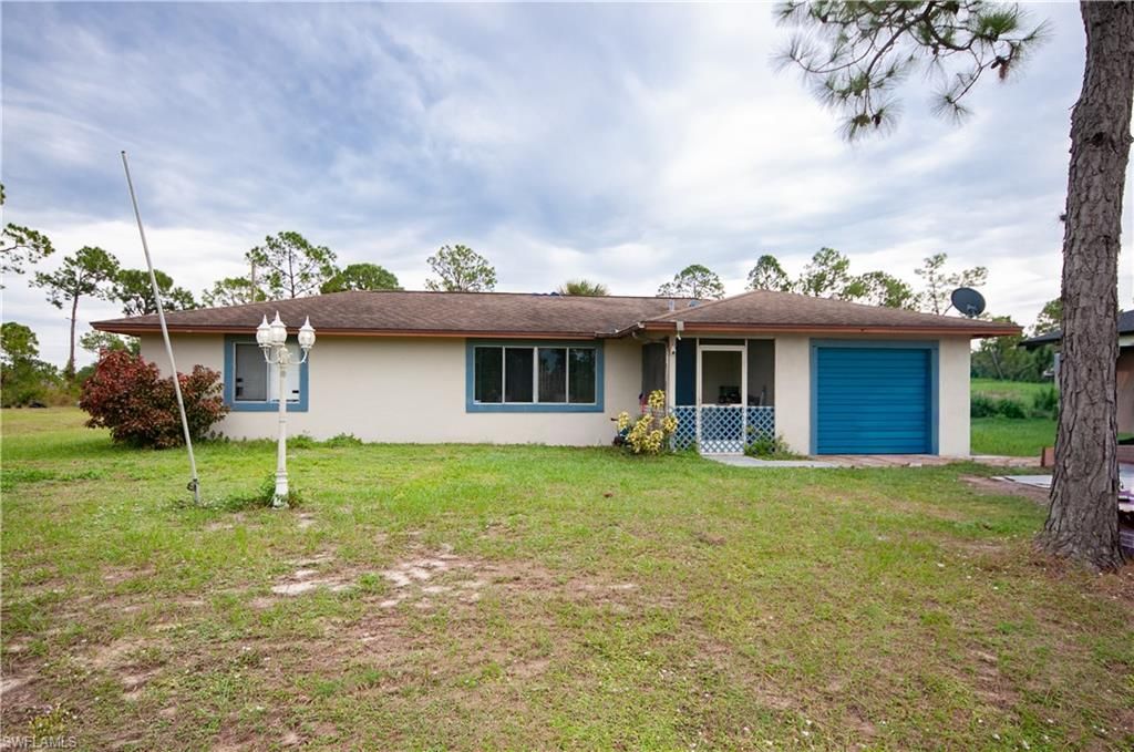 404 Irving AVE, LEHIGH ACRES, FL 33972 — exterior