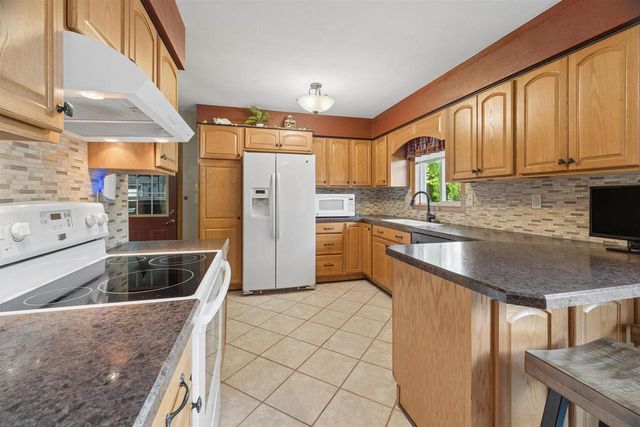 1135 HERITAGE TRAIL, Oshkosh, WI 54904