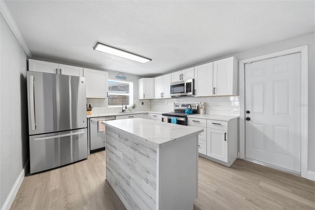 1446 WEYFORD LANE, Holiday, FL 34691