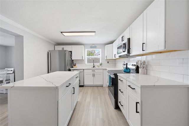 1446 WEYFORD LANE, Holiday, FL 34691