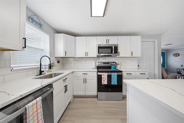 1446 WEYFORD LANE, Holiday, FL 34691