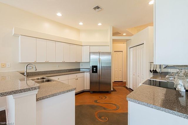 2252 Heritage Greens DR, Naples, FL 34119