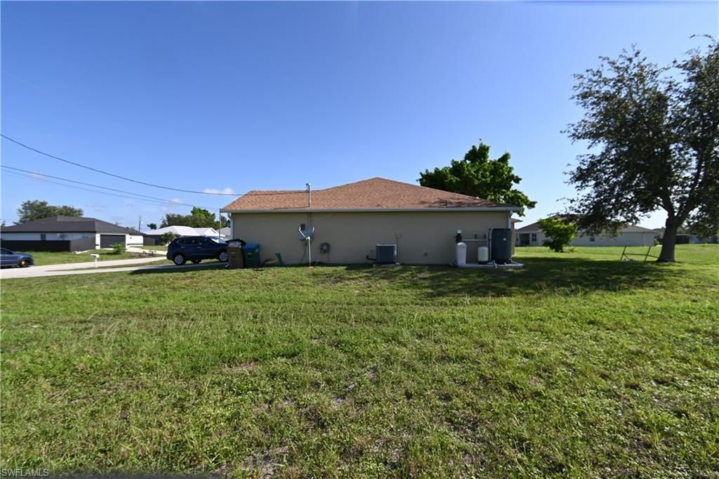 1701 NE 6th PL, CAPE CORAL, FL 33909 — photo 3