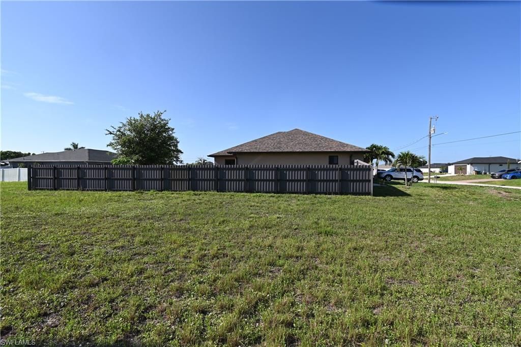 1701 NE 6th PL, CAPE CORAL, FL 33909 — photo 4