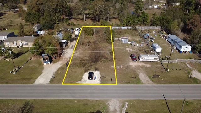 319 County Road 3550, Cleveland, TX 77327