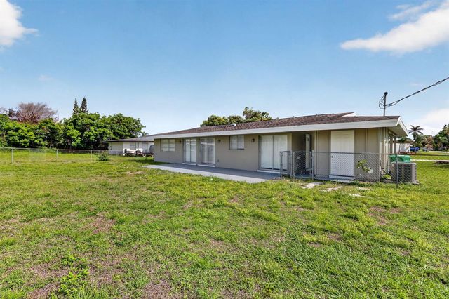 157 SE Calmoso Drive, Port St. Lucie, FL 34983
