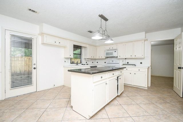 6702 Spring Leaf Drive, Spring, TX 77379