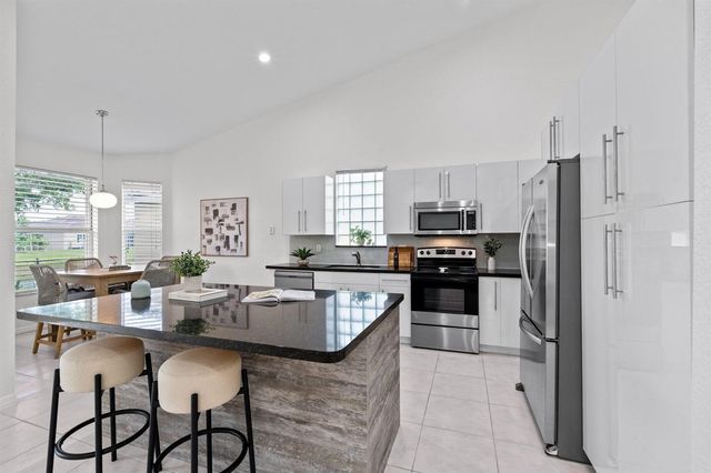 5954 NW 74th Street, Parkland, FL 33067