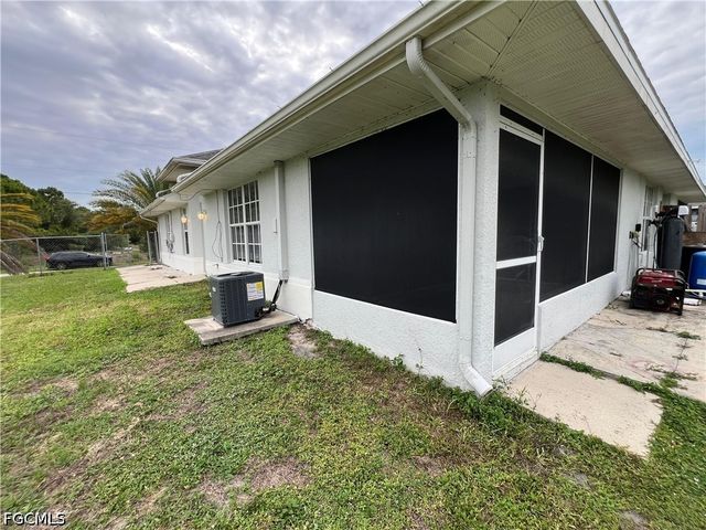 1543 Hightower AVE S, Lehigh Acres, FL 33973