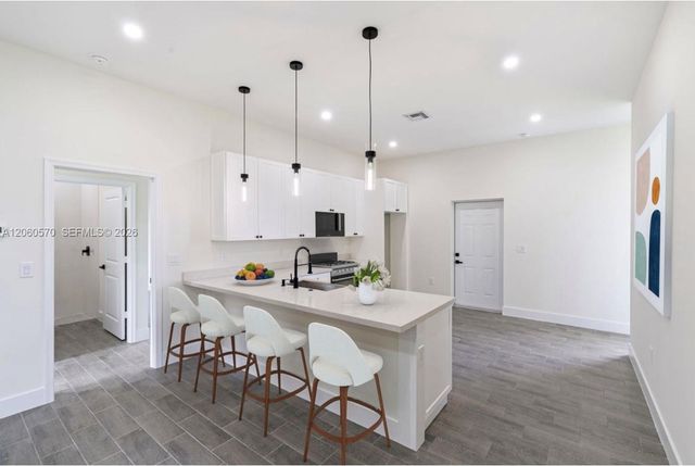 708 PEACOCK AVE, Lehigh Acres, FL 33974