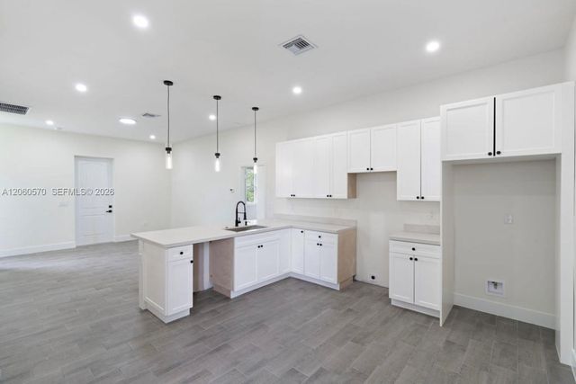 708 PEACOCK AVE, Lehigh Acres, FL 33974