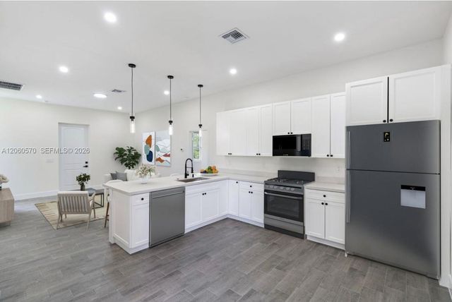 708 PEACOCK AVE, Lehigh Acres, FL 33974