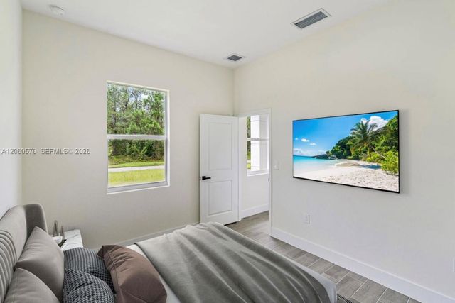 708 PEACOCK AVE, Lehigh Acres, FL 33974