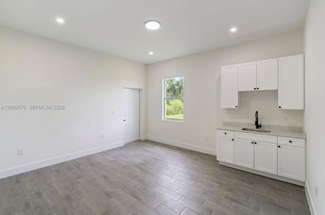 708 PEACOCK AVE, Lehigh Acres, FL 33974