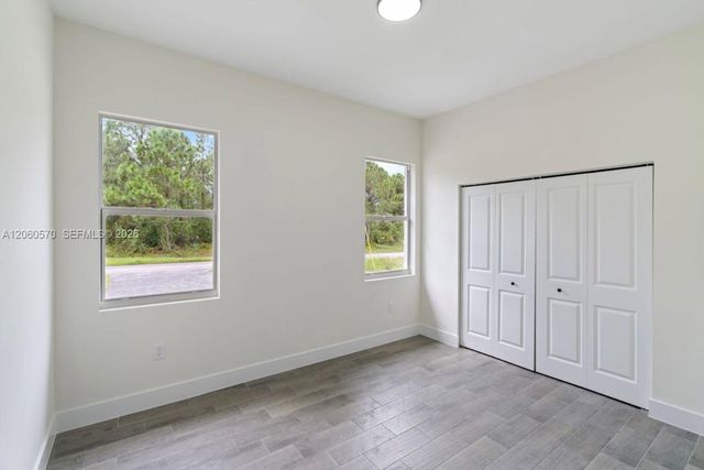 708 PEACOCK AVE, Lehigh Acres, FL 33974