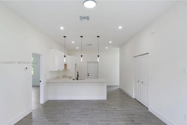 708 PEACOCK AVE, Lehigh Acres, FL 33974